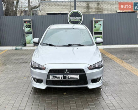 Серый Мицубиси Лансер, объемом двигателя 2 л и пробегом 220 тыс. км за 6500 $, фото 1 на Automoto.ua