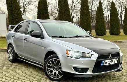 Сірий Міцубісі Lancer, об'ємом двигуна 2 л та пробігом 1 тис. км за 3750 $, фото 1 на Automoto.ua