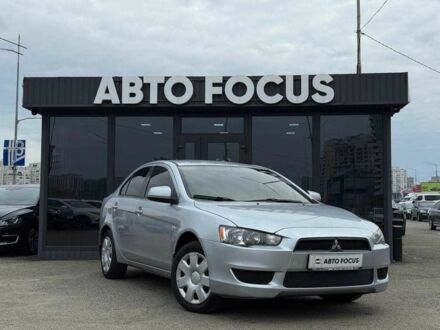 Серый Мицубиси Лансер, объемом двигателя 1.5 л и пробегом 233 тыс. км за 5890 $, фото 1 на Automoto.ua