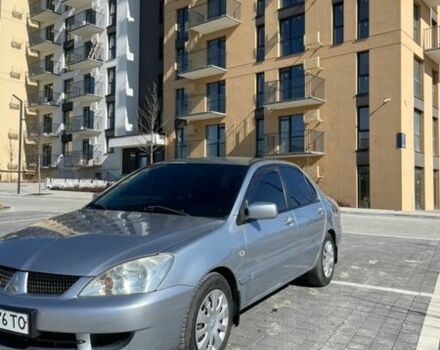 Серый Мицубиси Лансер, объемом двигателя 1.58 л и пробегом 192 тыс. км за 4500 $, фото 1 на Automoto.ua