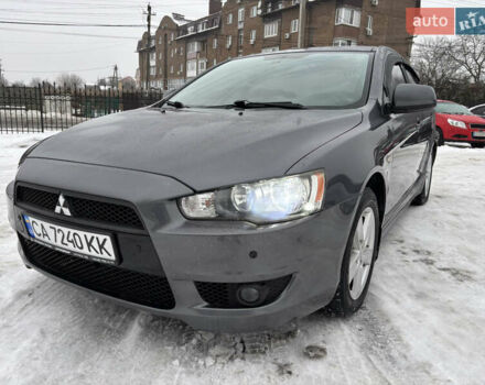 Серый Мицубиси Лансер, объемом двигателя 2 л и пробегом 163 тыс. км за 7500 $, фото 1 на Automoto.ua