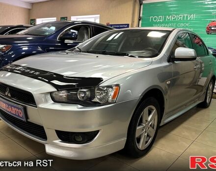 Серый Мицубиси Лансер, объемом двигателя 1.5 л и пробегом 241 тыс. км за 6400 $, фото 1 на Automoto.ua