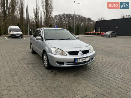 Сірий Міцубісі Lancer, об'ємом двигуна 1.58 л та пробігом 280 тис. км за 4650 $, фото 1 на Automoto.ua