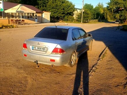 Міцубісі Lancer 2009 у Царичанке на Automoto.ua Сірий Міцубісі Lancer, об'ємом двигуна 1.6 л та пробігом 205 тис. км за 4000 $, фото 1 на Automoto.ua