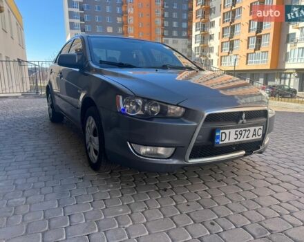 Серый Мицубиси Лансер, объемом двигателя 1.5 л и пробегом 218 тыс. км за 4300 $, фото 1 на Automoto.ua