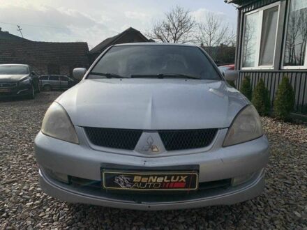 Сірий Міцубісі Lancer, об'ємом двигуна 1.6 л та пробігом 227 тис. км за 3599 $, фото 1 на Automoto.ua