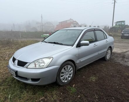 Сірий Міцубісі Lancer, об'ємом двигуна 1.6 л та пробігом 230 тис. км за 3400 $, фото 1 на Automoto.ua