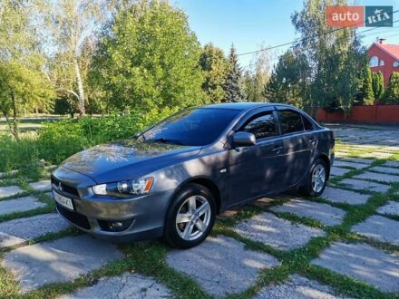 Серый Мицубиси Лансер, объемом двигателя 1.5 л и пробегом 183 тыс. км за 5900 $, фото 1 на Automoto.ua