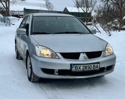 Серый Мицубиси Лансер, объемом двигателя 1.6 л и пробегом 240 тыс. км за 3699 $, фото 1 на Automoto.ua