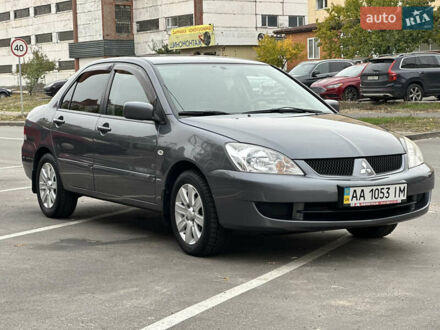 Мицубиси Лансер 2009 в Киеве на Automoto.ua Серый Мицубиси Лансер, объемом двигателя 1.58 л и пробегом 94 тыс. км за 5990 $, фото 1 на Automoto.ua