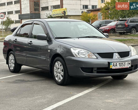 Сірий Міцубісі Lancer, об'ємом двигуна 1.58 л та пробігом 94 тис. км за 5990 $, фото 1 на Automoto.ua