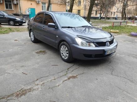 Сірий Міцубісі Lancer, об'ємом двигуна 0.16 л та пробігом 190 тис. км за 5000 $, фото 1 на Automoto.ua