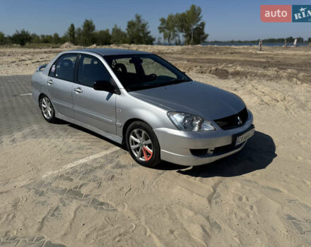 Сірий Міцубісі Lancer, об'ємом двигуна 1.6 л та пробігом 337 тис. км за 4500 $, фото 1 на Automoto.ua