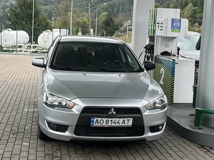 Сірий Міцубісі Lancer, об'ємом двигуна 2 л та пробігом 143 тис. км за 6850 $, фото 1 на Automoto.ua
