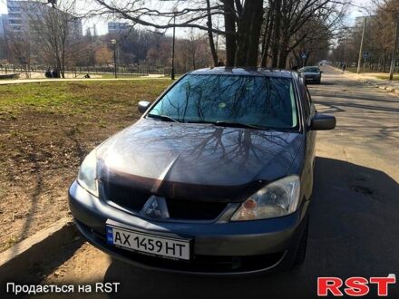 Сірий Міцубісі Lancer, об'ємом двигуна 1.6 л та пробігом 230 тис. км за 4200 $, фото 1 на Automoto.ua