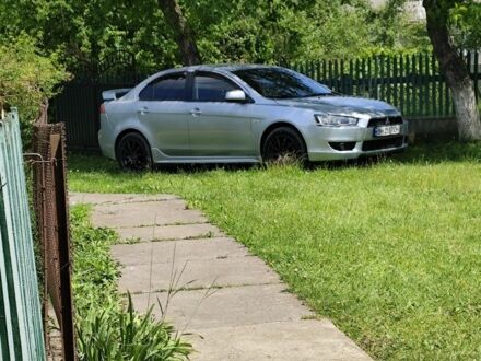 Серый Мицубиси Лансер, объемом двигателя 1.5 л и пробегом 170 тыс. км за 9000 $, фото 1 на Automoto.ua