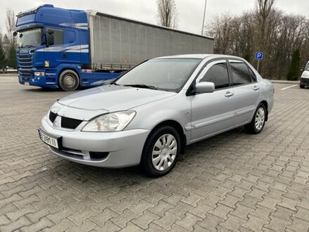 Сірий Міцубісі Lancer, об'ємом двигуна 1.6 л та пробігом 240 тис. км за 4650 $, фото 1 на Automoto.ua