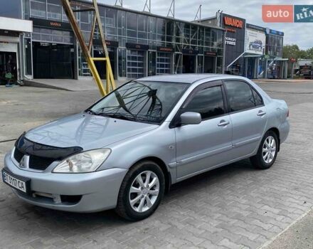 Сірий Міцубісі Lancer, об'ємом двигуна 1.58 л та пробігом 209 тис. км за 4600 $, фото 1 на Automoto.ua