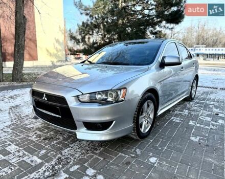 Серый Мицубиси Лансер, объемом двигателя 2 л и пробегом 173 тыс. км за 7900 $, фото 1 на Automoto.ua