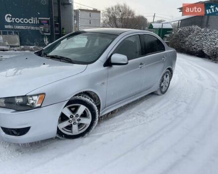 Серый Мицубиси Лансер, объемом двигателя 2 л и пробегом 289 тыс. км за 4950 $, фото 1 на Automoto.ua