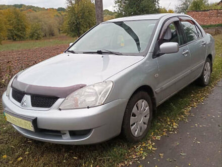 Мицубиси Лансер 2009 в Черкассах на Automoto.ua Серый Мицубиси Лансер, объемом двигателя 1.58 л и пробегом 227 тыс. км за 6200 $, фото 1 на Automoto.ua