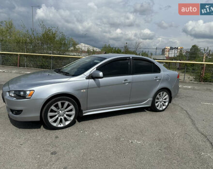 Серый Мицубиси Лансер, объемом двигателя 2 л и пробегом 114 тыс. км за 6800 $, фото 1 на Automoto.ua