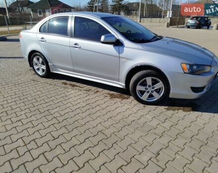 Серый Мицубиси Лансер, объемом двигателя 2 л и пробегом 199 тыс. км за 6400 $, фото 1 на Automoto.ua