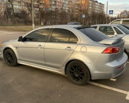 Серый Мицубиси Лансер, объемом двигателя 2 л и пробегом 289 тыс. км за 6500 $, фото 1 на Automoto.ua