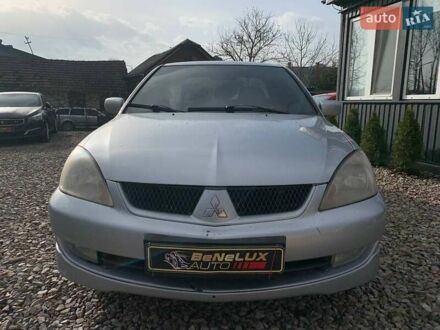 Сірий Міцубісі Lancer, об'ємом двигуна 1.58 л та пробігом 227 тис. км за 3599 $, фото 1 на Automoto.ua