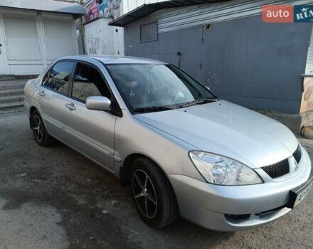 Сірий Міцубісі Lancer, об'ємом двигуна 1.6 л та пробігом 60 тис. км за 7000 $, фото 1 на Automoto.ua