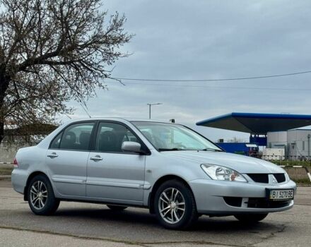 Серый Мицубиси Лансер, объемом двигателя 1.6 л и пробегом 161 тыс. км за 5200 $, фото 1 на Automoto.ua