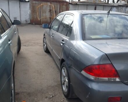 Серый Мицубиси Лансер, объемом двигателя 1.6 л и пробегом 280 тыс. км за 4100 $, фото 1 на Automoto.ua