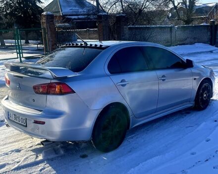 Серый Мицубиси Лансер, объемом двигателя 2 л и пробегом 187 тыс. км за 6500 $, фото 1 на Automoto.ua