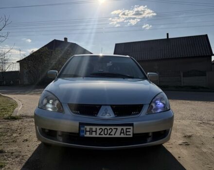Сірий Міцубісі Lancer, об'ємом двигуна 1.6 л та пробігом 294 тис. км за 4300 $, фото 1 на Automoto.ua