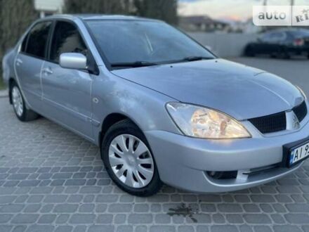 Сірий Міцубісі Lancer, об'ємом двигуна 1.6 л та пробігом 188 тис. км за 5700 $, фото 1 на Automoto.ua