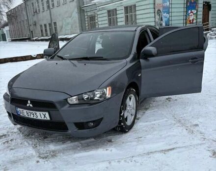 Серый Мицубиси Лансер, объемом двигателя 2 л и пробегом 187 тыс. км за 7000 $, фото 1 на Automoto.ua