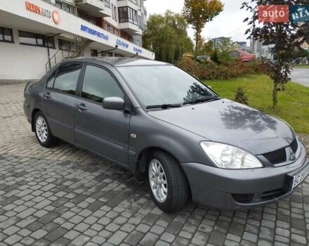 Сірий Міцубісі Lancer, об'ємом двигуна 1.58 л та пробігом 209 тис. км за 2900 $, фото 1 на Automoto.ua