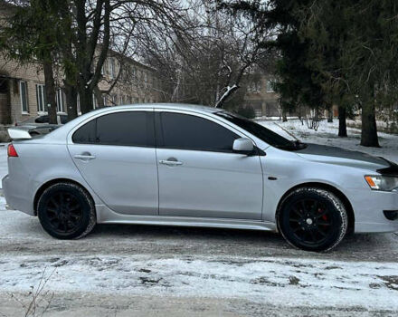 Серый Мицубиси Лансер, объемом двигателя 2 л и пробегом 190 тыс. км за 6900 $, фото 1 на Automoto.ua