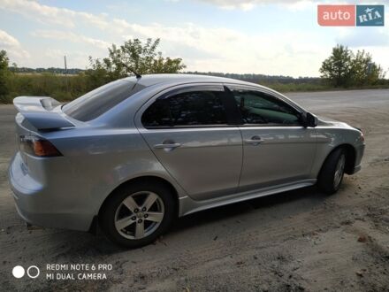 Сірий Міцубісі Lancer, об'ємом двигуна 2 л та пробігом 231 тис. км за 7500 $, фото 1 на Automoto.ua