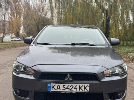 Серый Мицубиси Лансер, объемом двигателя 1.5 л и пробегом 116 тыс. км за 6000 $, фото 1 на Automoto.ua