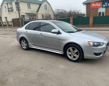 Серый Мицубиси Лансер, объемом двигателя 2 л и пробегом 297 тыс. км за 5350 $, фото 1 на Automoto.ua