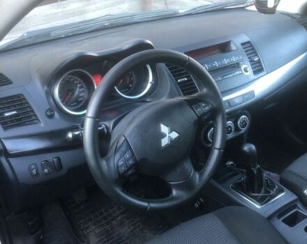 Серый Мицубиси Лансер, объемом двигателя 2 л и пробегом 171 тыс. км за 6200 $, фото 1 на Automoto.ua