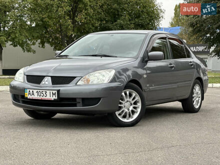 Сірий Міцубісі Lancer, об'ємом двигуна 1.58 л та пробігом 94 тис. км за 6500 $, фото 1 на Automoto.ua