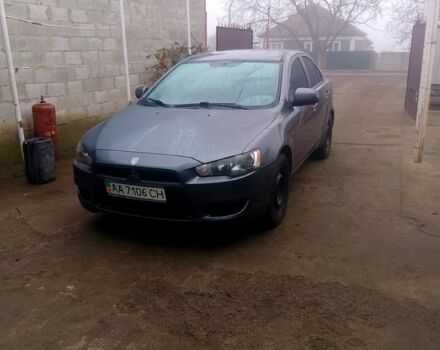 Серый Мицубиси Лансер, объемом двигателя 1.5 л и пробегом 250 тыс. км за 5400 $, фото 1 на Automoto.ua