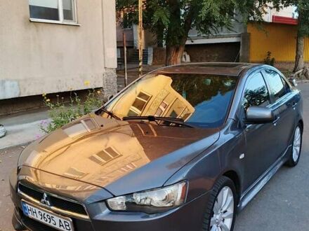 Серый Мицубиси Лансер, объемом двигателя 2.36 л и пробегом 225 тыс. км за 8500 $, фото 1 на Automoto.ua