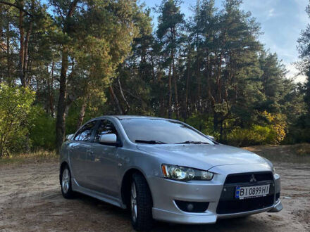 Сірий Міцубісі Lancer, об'ємом двигуна 2 л та пробігом 239 тис. км за 6999 $, фото 1 на Automoto.ua