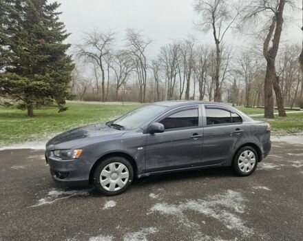 Серый Мицубиси Лансер, объемом двигателя 1.5 л и пробегом 187 тыс. км за 6950 $, фото 1 на Automoto.ua