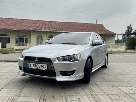 Міцубісі Lancer 2010 у Кобеляках на Automoto.ua Сірий Міцубісі Lancer, об'ємом двигуна 2 л та пробігом 230 тис. км за 7150 $, фото 1 на Automoto.ua