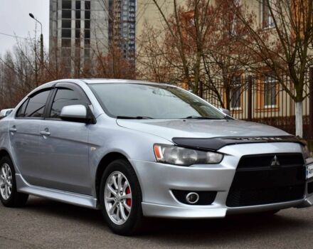 Серый Мицубиси Лансер, объемом двигателя 2 л и пробегом 178 тыс. км за 7400 $, фото 1 на Automoto.ua
