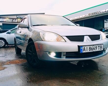Сірий Міцубісі Lancer, об'ємом двигуна 1.6 л та пробігом 312 тис. км за 5250 $, фото 1 на Automoto.ua